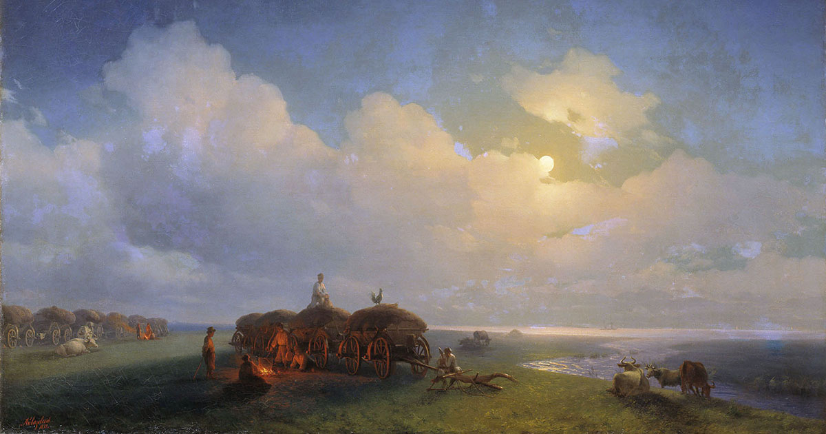 A line of ox-drawn wagons halted on a flat, open steppe at dusk, with drovers resting beside a small fire beneath a wide evening sky.